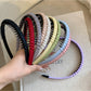 Gifty headband worn by a model with short hair in a casual outfit