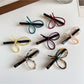 Beau - Openwork Bow Hair Clip