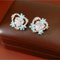 Earedge - Alloy Heart Flower Detail Stud Earrings