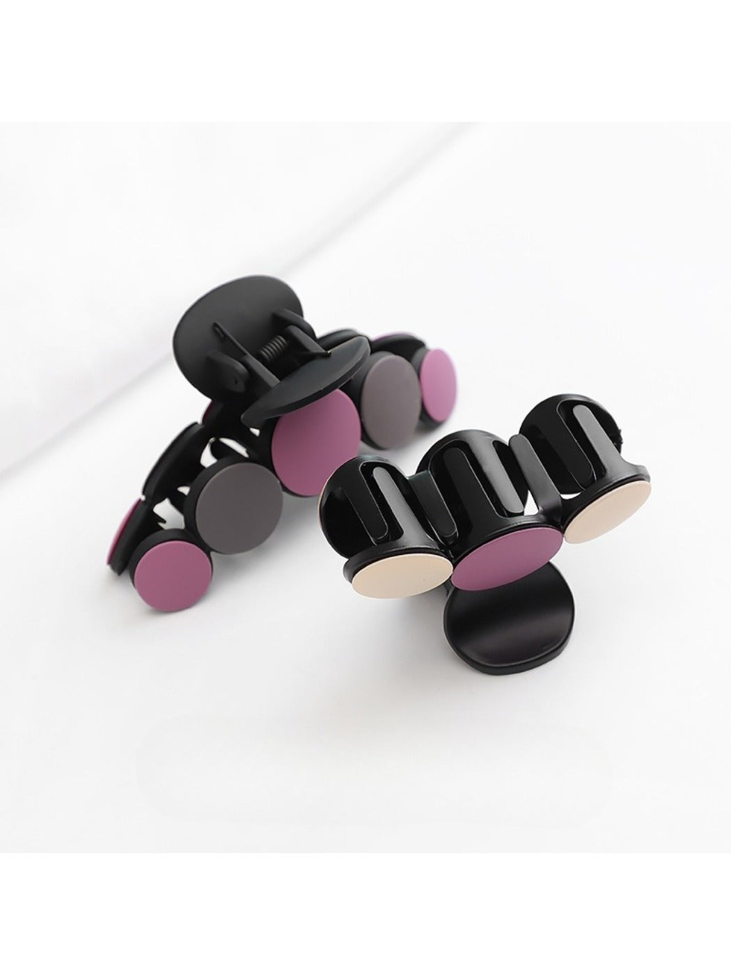 Beau hair clip attached to brown hair styled in loose waves