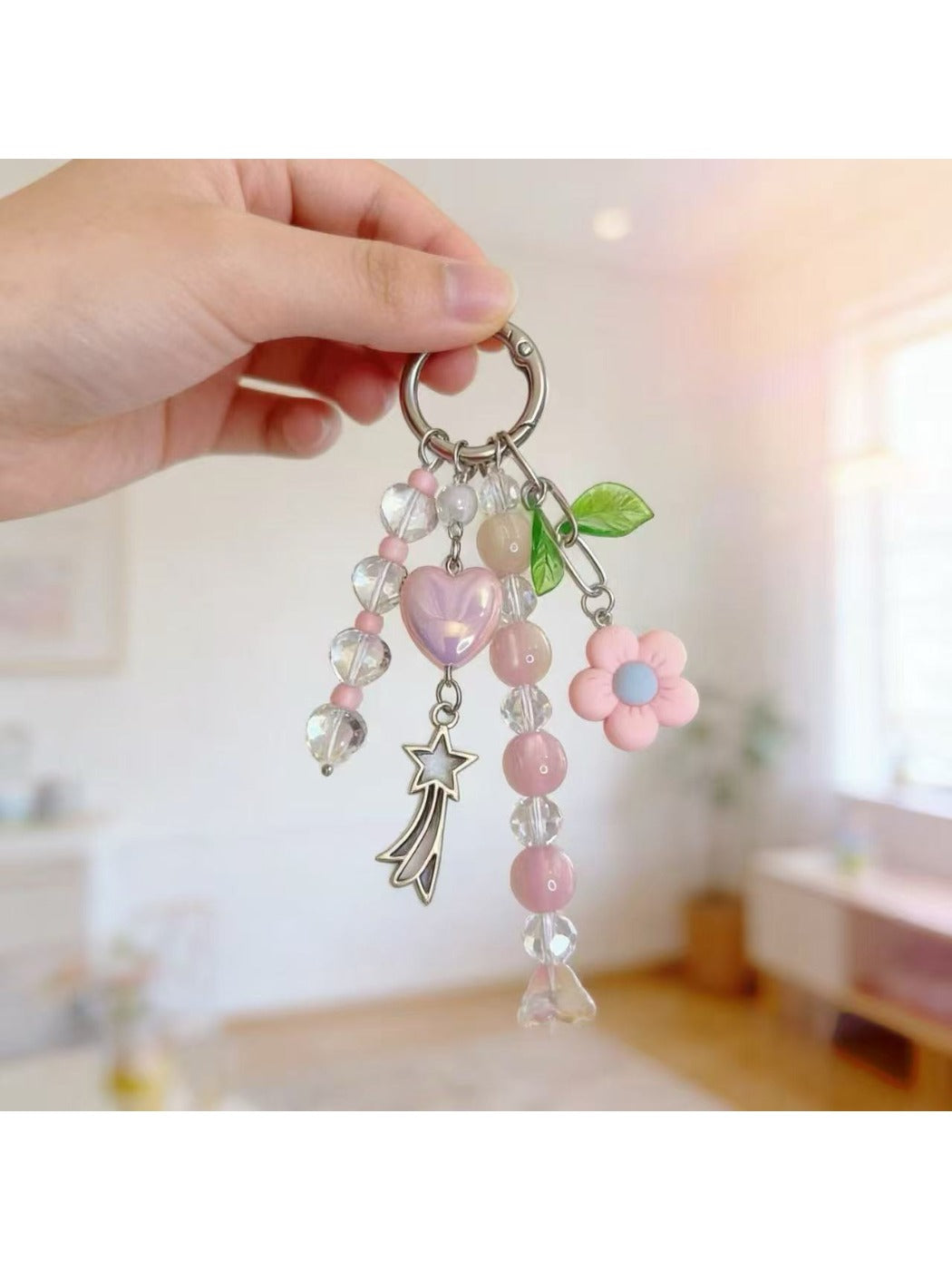 Keypus beaded heart charm keychain displayed on a white background