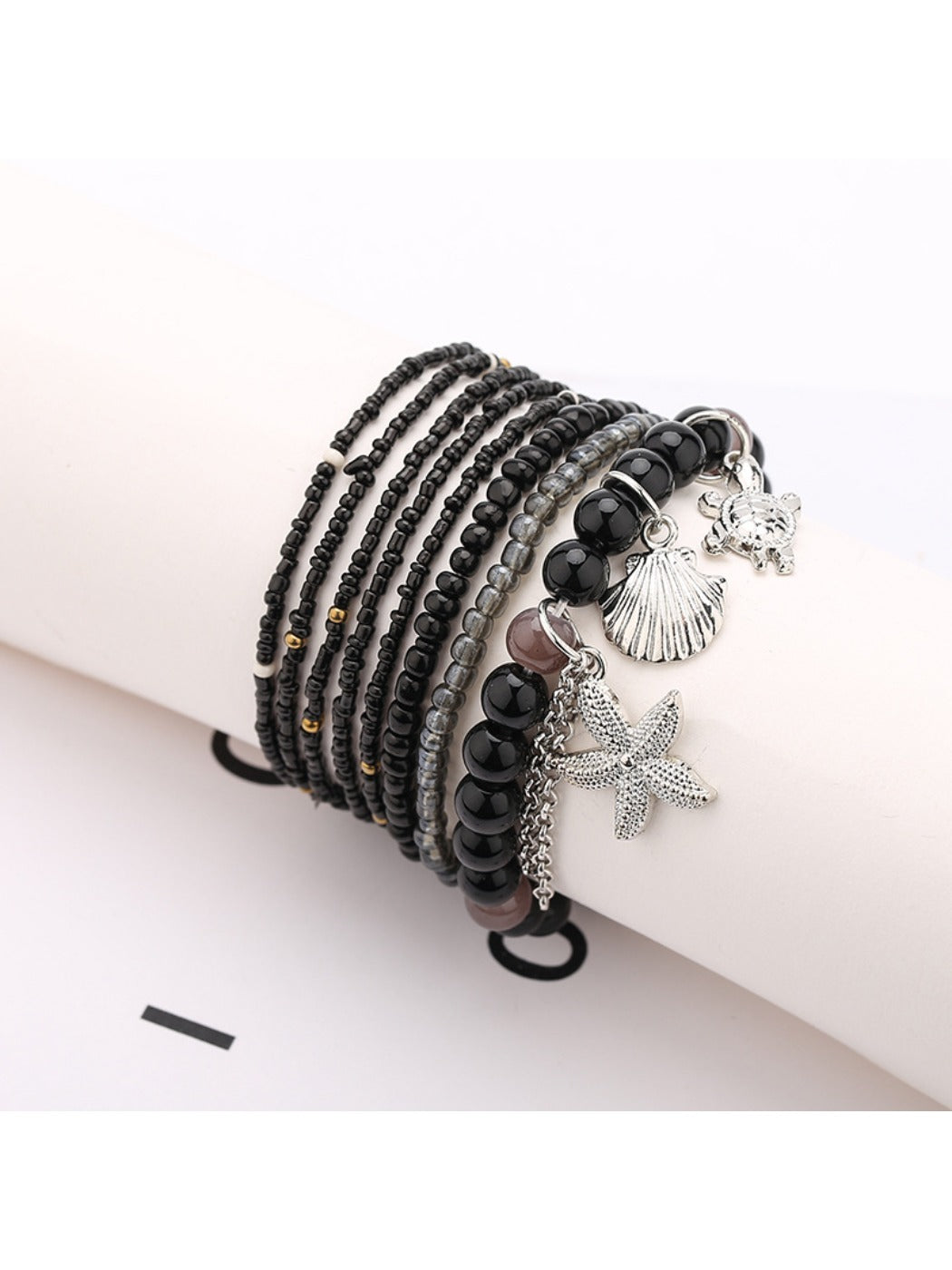 Lovra bracelet worn on wrist displaying multi-row colorful bead design