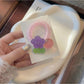 Gifty - Plastic Flower Bead Spiral Ponytail Hair Tie