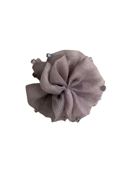 Close-up of Beau purple mesh hair clip showing texture and clasp