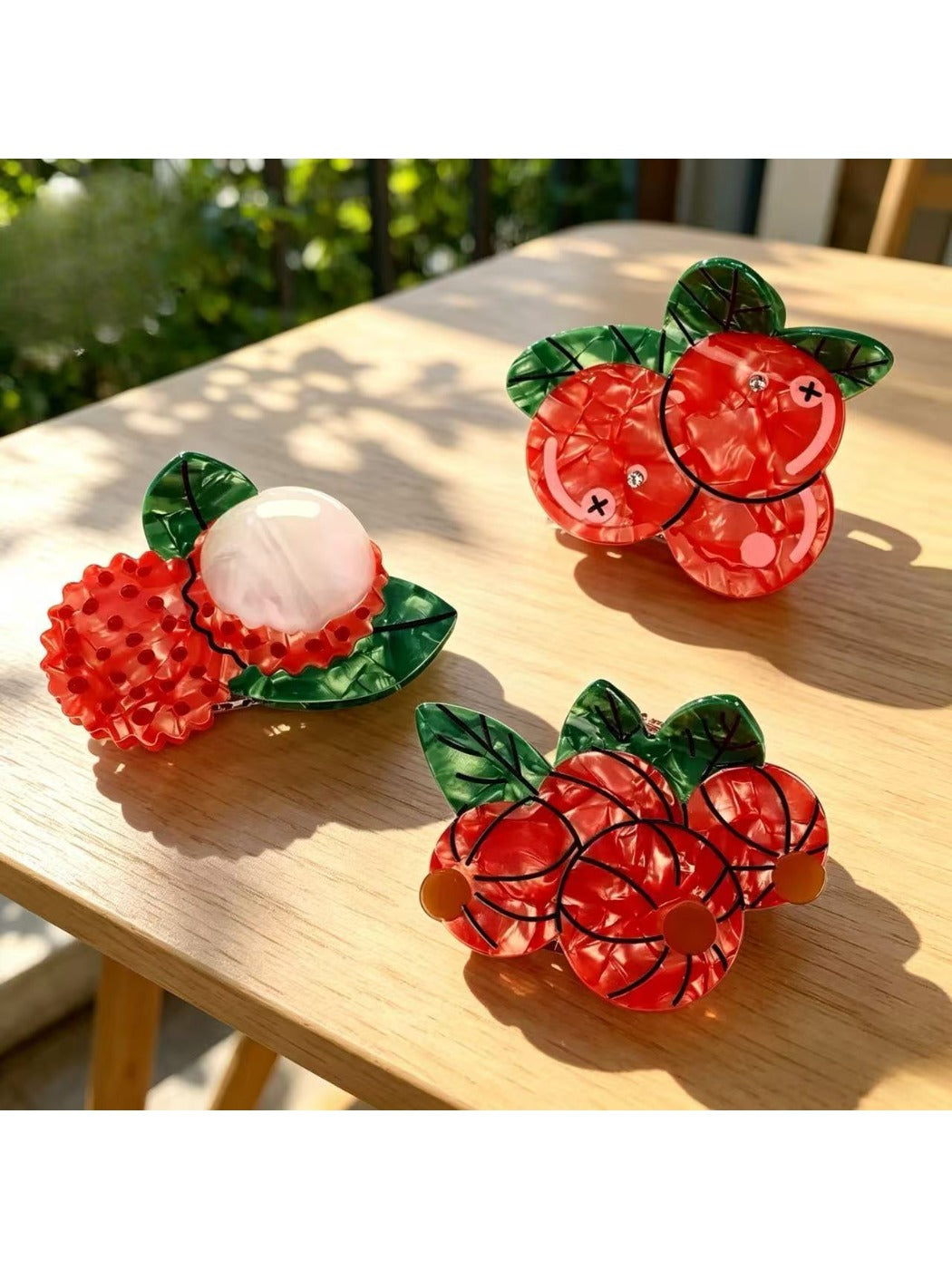 Beau 3D fruit shape claw clip in orange color with detailed fruit texture