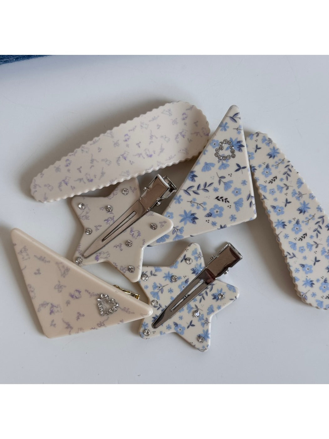 Side view of Beau printed triangle star hair clip highlighting clip mechanism
