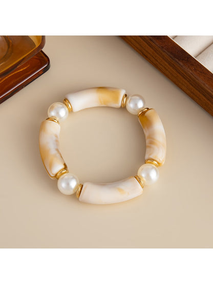 Lovra vintage beaded link bracelet paired with casual outfit on model