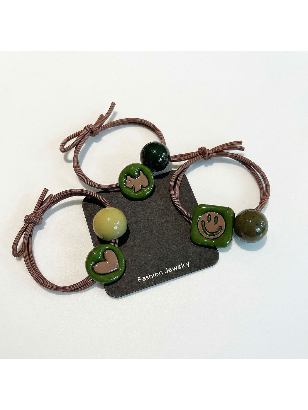Gifty - Double Strand Smiley Heart Charm Hair Tie