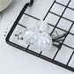 Beau small butterfly claw clip displayed alongside matching hair accessories