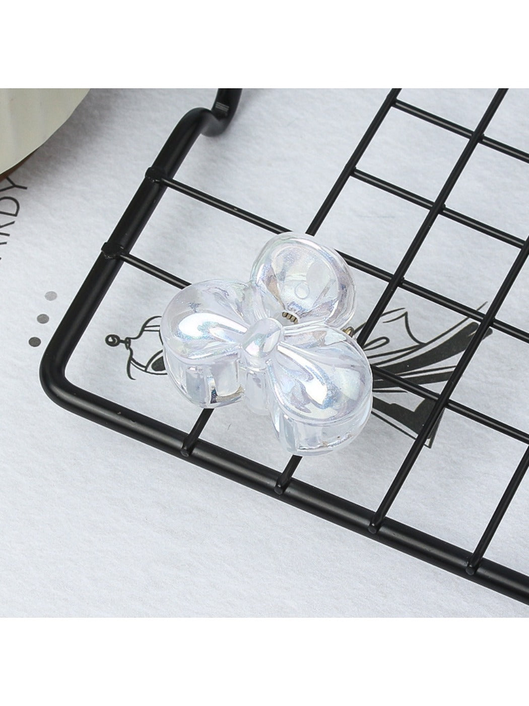 Beau small butterfly claw clip displayed alongside matching hair accessories