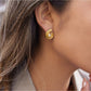 Earedge - Chic Twisted C-Hoop Earrings