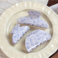 Side view of Beau blue floral hair claw clip highlighting spring mechanism
