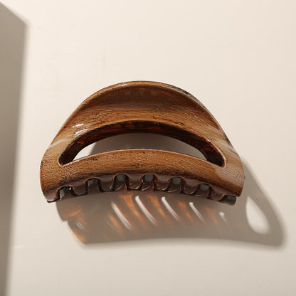 Beau - Glossy PS Curved Hollow Design Claw Clip