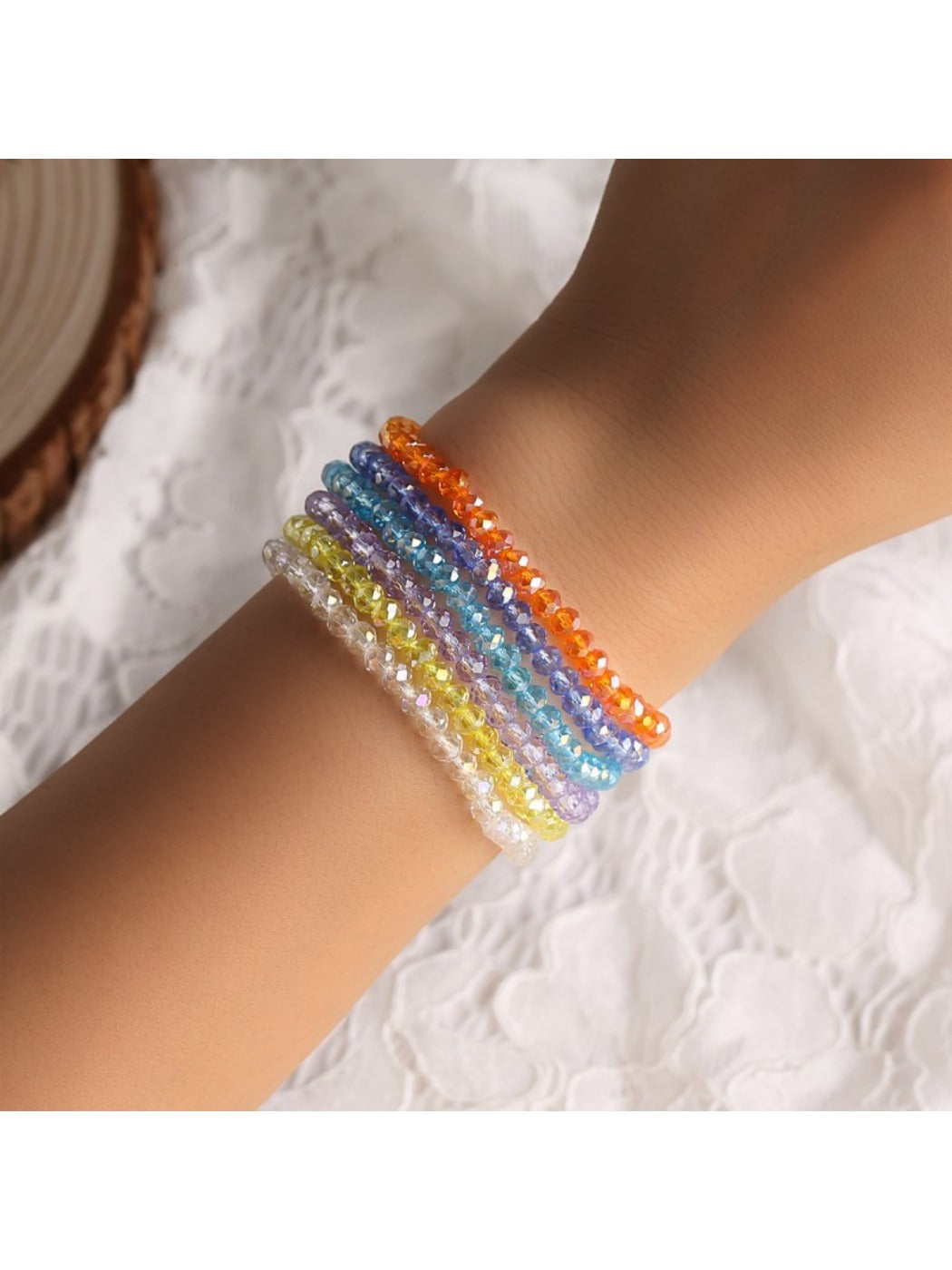 Close-up of Lovra stylish layered beaded bracelet with mixed metal and stone beads