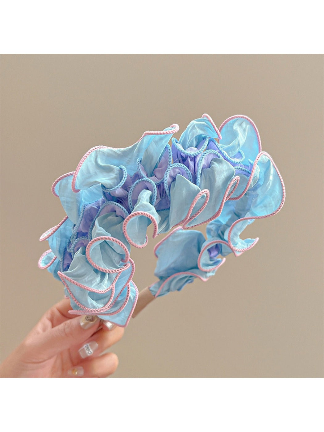 Top view of Gifty ruffle pleated fabric headband highlighting fabric details