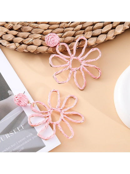 Earedge flower shaped openwork drop earrings packaged in branded jewelry box