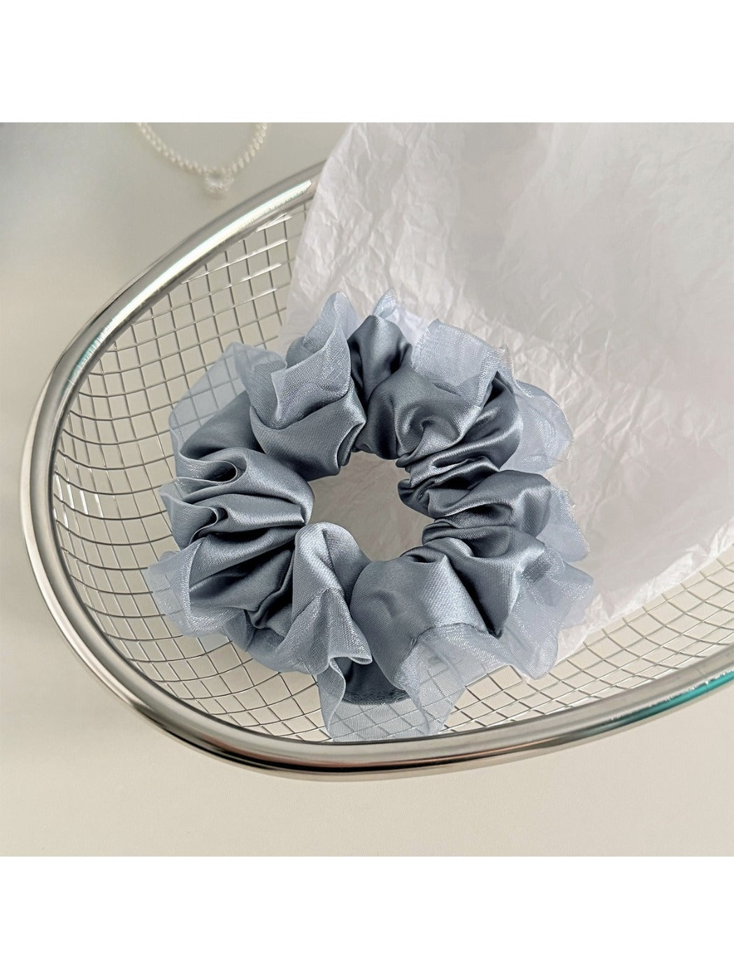 Side view of Gifty satin tulle scrunchie with ruffle trim