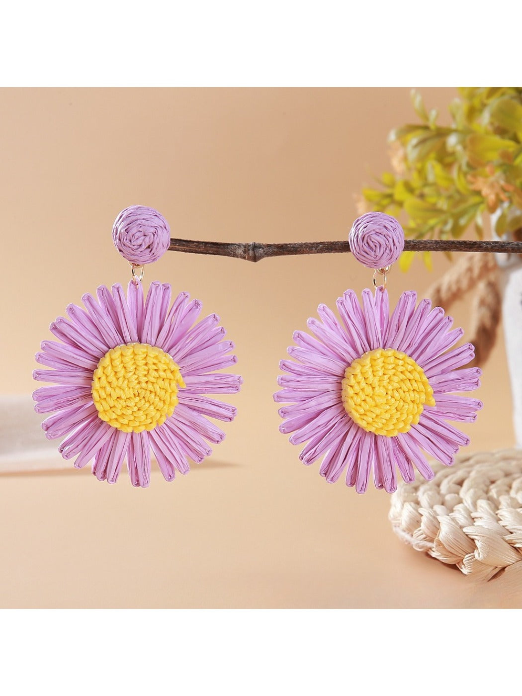 Vintage sunflower earrings styled with casual summer outfit on a model