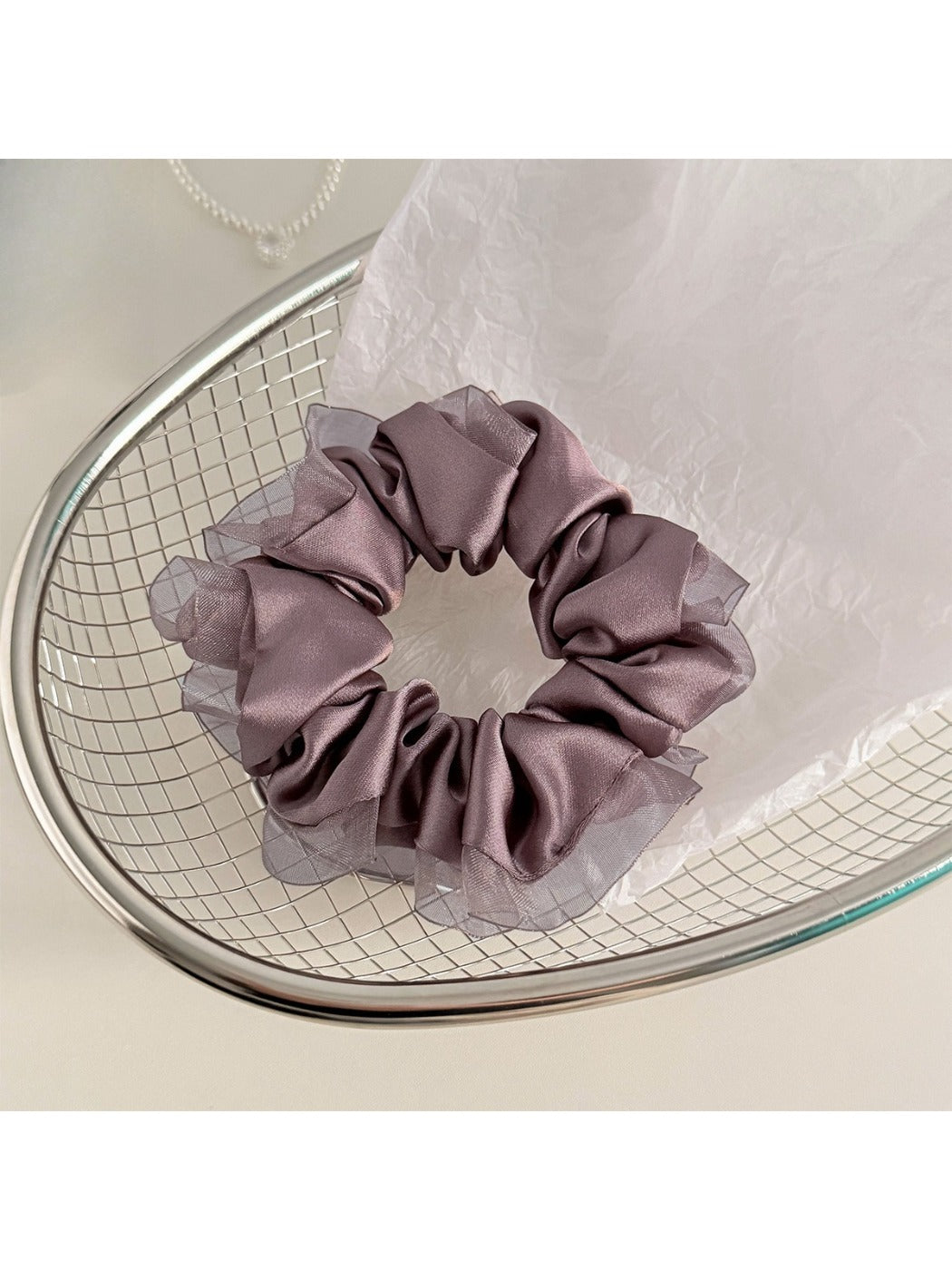 Gifty satin tulle scrunchie styled with casual outfit on model