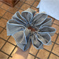Flat lay of Gifty checked pattern scrunchie on white background