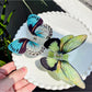 Close-up of Beau butterfly hair claw clip showing curved wings and clasp