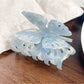 Top view of Beau butterfly hair claw clip displaying symmetrical wing pattern