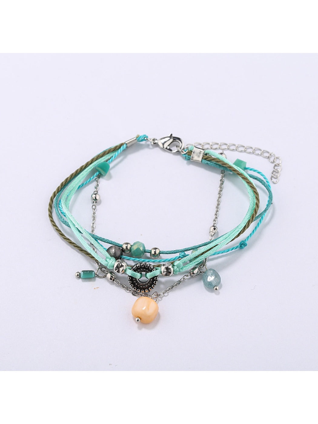 Lovra small bead alloy bracelet coiled to show flexibility and bead arrangement