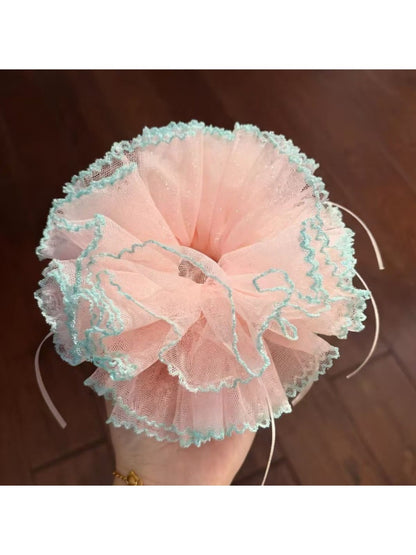 Gifty sweet ruffle scrunchie in pastel color arranged with matching accessories