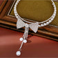 Nozari - Layered Bow Tassel Rhinestone Necklace