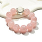 Lovra pink beaded crystal bracelet displayed flat showing round pink beads and silver accents