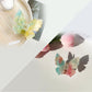 Beau butterfly claw clip in soft pastel color with metal spring visible