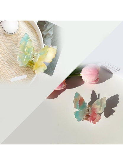 Beau butterfly claw clip in soft pastel color with metal spring visible