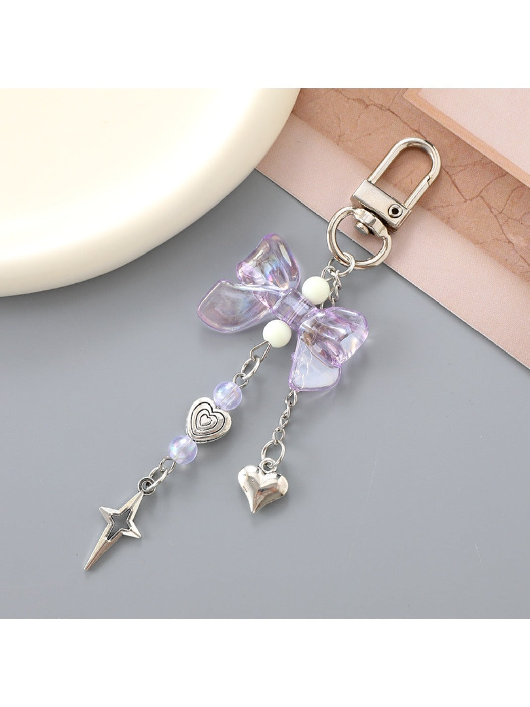 Keypus - Heart Shaped Star Pendant Bow Keychain