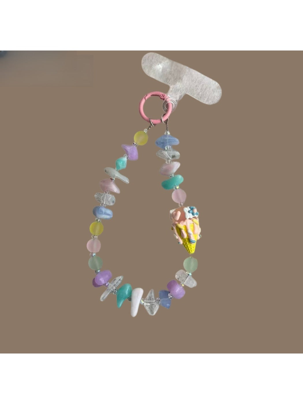 Keypus beaded phone strap keychain displayed with matching accessories on a white background