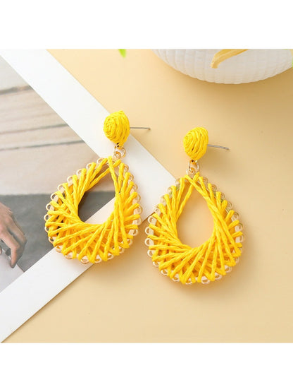 Earedge elegant hollow drop woven earrings styled with casual outfit