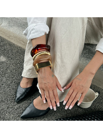 Side view of Lovra Chic Irregular Bangle Bracelet displaying unique shape