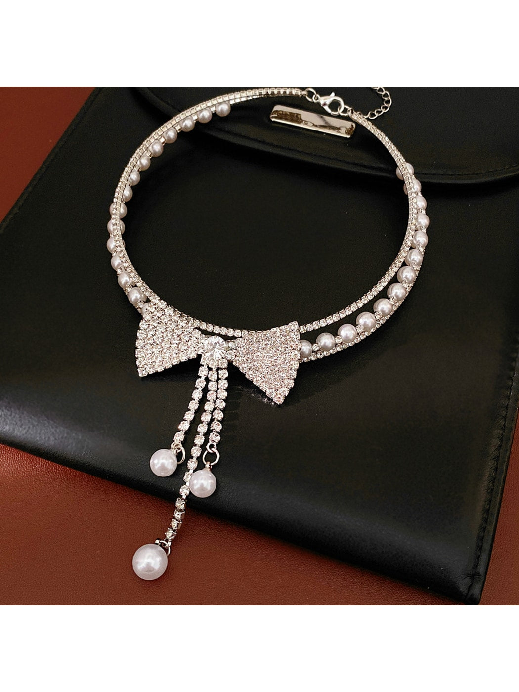 Nozari - Layered Bow Tassel Rhinestone Necklace