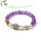 Lovra color block bracelet worn on wrist with amethyst and beige beads