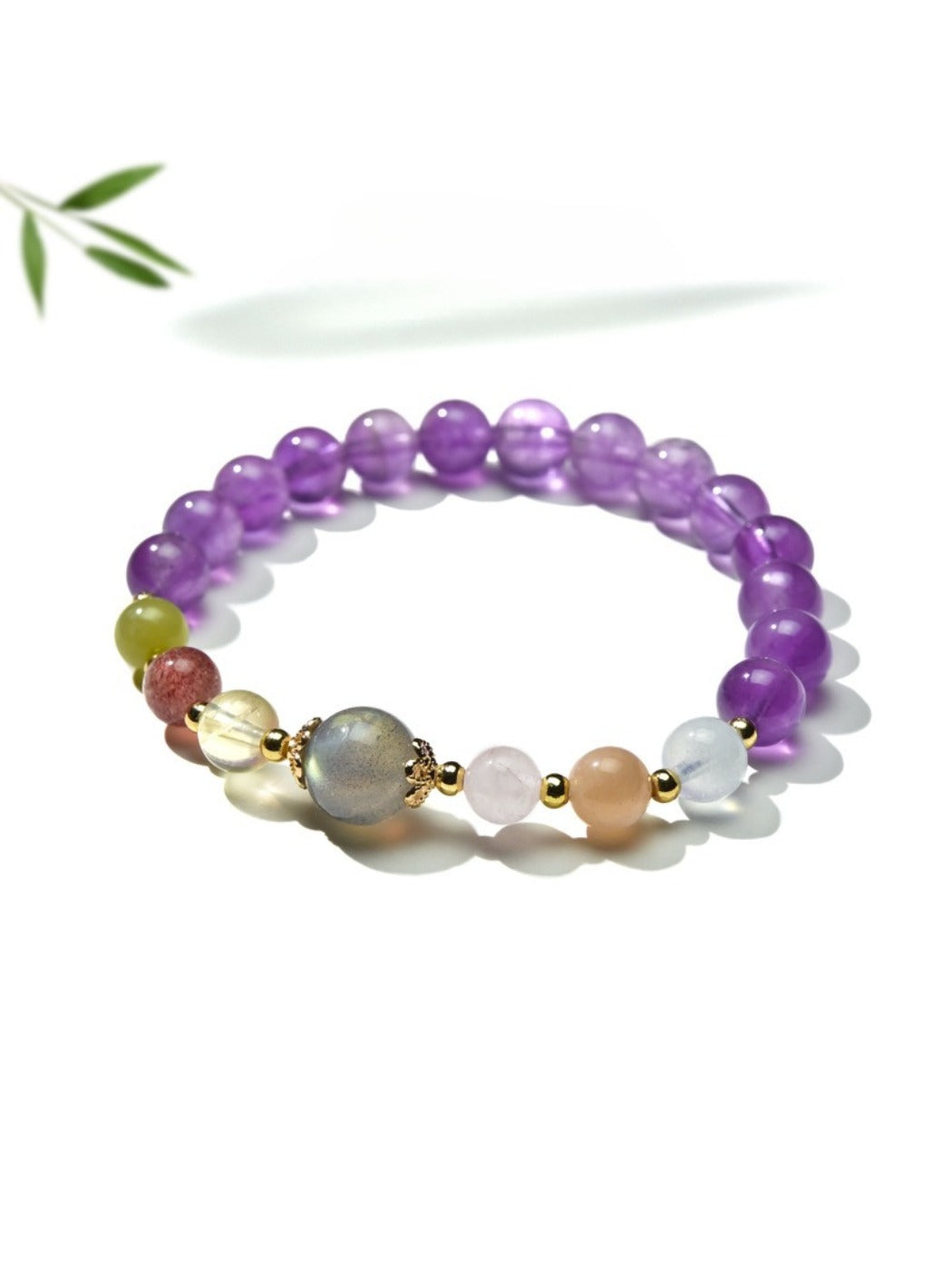 Lovra color block bracelet worn on wrist with amethyst and beige beads