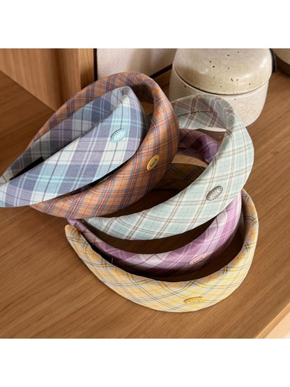 Side view of Gifty patterned headband highlighting elastic band and vibrant colors