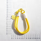 Close-up of the colorful braided rope forming a flower shape on the keychain