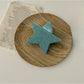 Beau star shaped claw clip positioned flat to show star shape outline