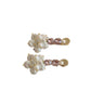 Beau Sweet Style flower hair clip displayed on a white card with branding