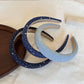 Gifty - Geometric Silver Star Detail Padded Headband