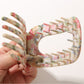Beau hair clip worn in model's hair showcasing size and pattern visibility