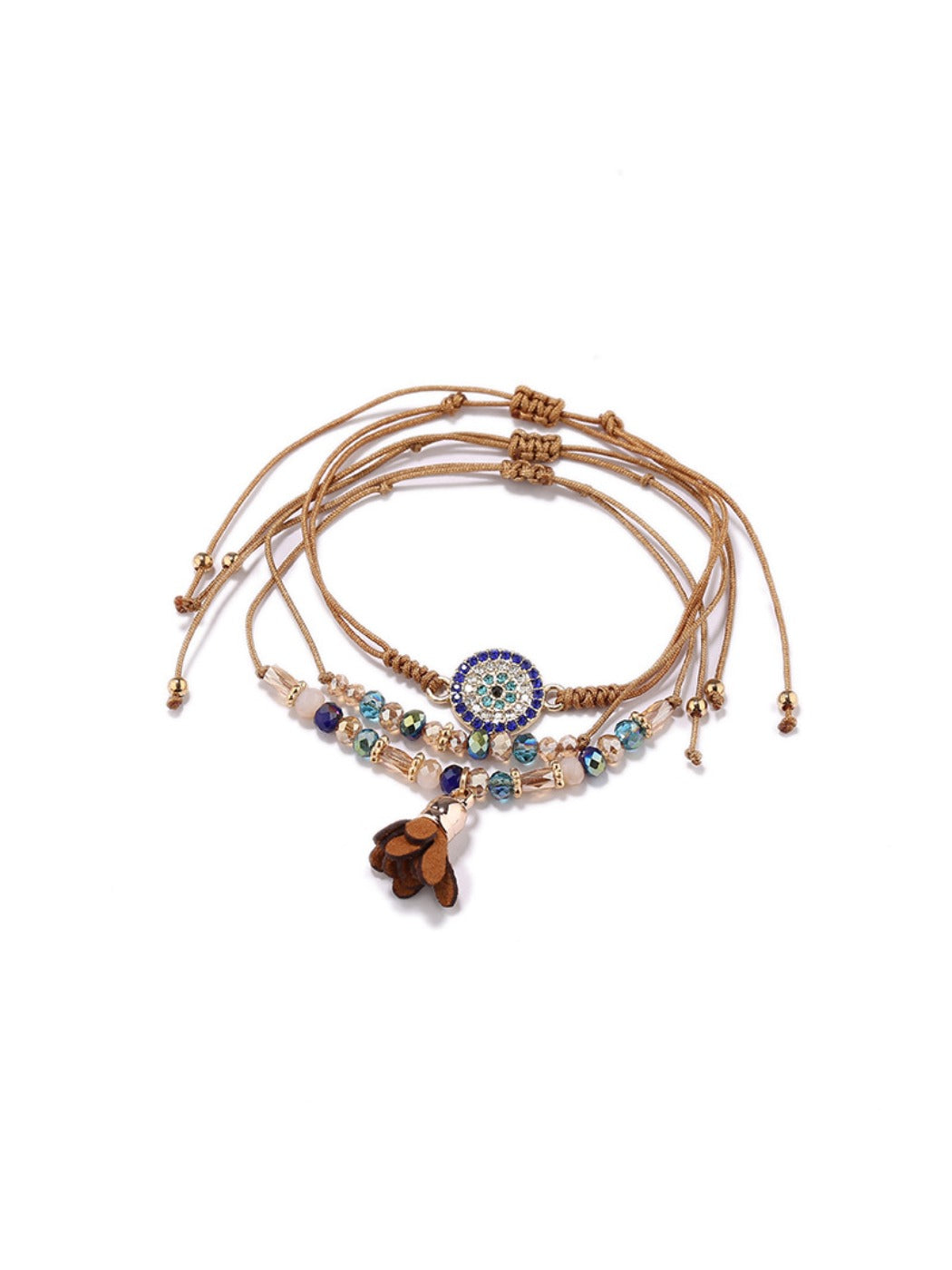 Detailed shot of tassel and small beads on Lovra alloy bracelet