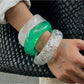 Lovra bangle bracelet worn on wrist showcasing its modern, asymmetrical design