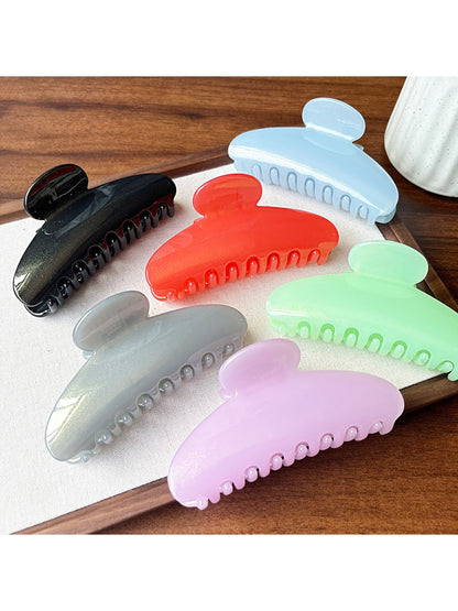 Close-up of Beau half round hair clip showing smooth matte black finish