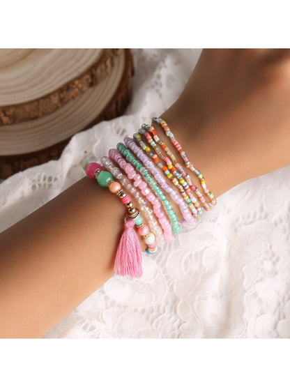 Lovra colorful multi strand beaded bracelet with vibrant mixed beads on a white background