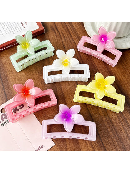 Close-up of Beau square ombre flower shaped claw clip showing petal details and clasp mechanism